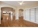 Open living space with hardwood floors, open floor plan, and view to the gourmet kitchen at 1755 Presidents Dr, Lawrenceville, GA 30043