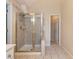 Elegant bathroom features a large shower with glass doors and tile surround, providing a luxurious showering experience at 1755 Presidents Dr, Lawrenceville, GA 30043