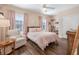 Charming bedroom featuring hardwood floors, plush seating, and plenty of natural light at 3632 Brookleigh Ln, Brookhaven, GA 30319