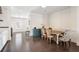 Dining area with a rustic wood table, comfortable chairs, and hardwood flooring at 3632 Brookleigh Ln, Brookhaven, GA 30319