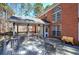 Charming brick house with a delightful back deck, screened-in porch, and ample seating for outdoor enjoyment at 5327 Saville Nw Dr, Acworth, GA 30101