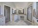 Spacious bathroom featuring granite countertops, a double vanity, a shower, and tile flooring at 5327 Saville Nw Dr, Acworth, GA 30101