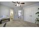 Bedroom with access to bathroom, stairs, and closet space at 5327 Saville Nw Dr, Acworth, GA 30101