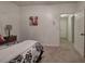 Bedroom with a view to the hallway and a cow painting at 5327 Saville Nw Dr, Acworth, GA 30101