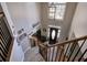 Grand foyer with a staircase, high ceilings, and a view of the front door, offering an impressive and inviting entrance at 5327 Saville Nw Dr, Acworth, GA 30101