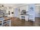 Kitchen seamlessly transitions to the dining area, featuring a cozy dining table and lots of natural light at 5327 Saville Nw Dr, Acworth, GA 30101