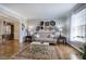 Comfortable living room with hardwood floors, neutral walls, and lots of natural light at 5327 Saville Nw Dr, Acworth, GA 30101