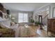 Comfortable living room with hardwood floors leading to the foyer at 5327 Saville Nw Dr, Acworth, GA 30101