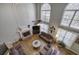 Spacious living room featuring a fireplace, hardwood floors, and abundant natural light at 5327 Saville Nw Dr, Acworth, GA 30101