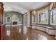 Inviting living room with a fireplace, built-in shelving, and bright, natural light at 1446 W Wesley Nw Rd, Atlanta, GA 30327