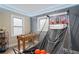 Fun game room featuring a basketball hoop, foosball table, and stylish decor at 2132 Penrose Dr, East Point, GA 30344