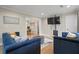 Bright living room featuring modern decor, cozy couches, and stylish accents at 2132 Penrose Dr, East Point, GA 30344