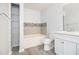 Well-lit bathroom featuring a tub and a modern vanity, offers a clean and comfortable space at 3525 Parc Sw Cir, Atlanta, GA 30311