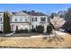 Beautiful two-story townhome with manicured landscaping, a blossoming tree, and a well-maintained front yard at 3525 Parc Sw Cir, Atlanta, GA 30311