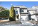 Charming two-story home with attached garage and well-maintained lawn, providing curb appeal and convenience at 3525 Parc Sw Cir, Atlanta, GA 30311