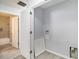 Well-lit laundry room featuring sleek, modern flooring and functional utility connections for added convenience at 3525 Parc Sw Cir, Atlanta, GA 30311