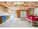 Spacious unfinished basement ready for customization, featuring exposed insulation and abundant storage space at 509 Plantation Creek Dr, Loganville, GA 30052