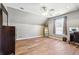Bright and airy bedroom featuring hardwood floors and natural light at 509 Plantation Creek Dr, Loganville, GA 30052