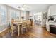 Breakfast room features tons of natural light, hardwood floors and connects to kitchen at 509 Plantation Creek Dr, Loganville, GA 30052