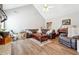 Spacious living room with vaulted ceiling and cozy fireplace at 509 Plantation Creek Dr, Loganville, GA 30052