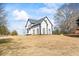 A well-maintained two-story home featuring an expansive lawn at 3955 Pucketts Rd, Snellville, GA 30039