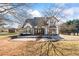 A charming two-story home with a beautiful rear deck and landscaping at 3955 Pucketts Rd, Snellville, GA 30039