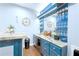 Well-equipped bar area with marble countertop, sink, mini-fridge, and glass storage for entertaining at 450 Congress Pkwy, Lawrenceville, GA 30044