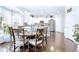 Dining area adjacent to kitchen, featuring a round table and decorative lighting at 450 Congress Pkwy, Lawrenceville, GA 30044