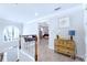 Upstairs hallway with staircase and a view into the main bedroom at 450 Congress Pkwy, Lawrenceville, GA 30044