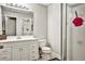 Bright bathroom with a white vanity, toilet, and glass-enclosed shower at 5065 Timberbridge Ln, Johns Creek, GA 30022