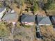 Aerial view of the home showcasing its location within a neighborhood with mature trees and well-kept lawns at 853 Erin Sw Ave, Atlanta, GA 30310