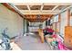 Messy garage space featuring a washer and dryer, storage, and wooden door at 853 Erin Sw Ave, Atlanta, GA 30310