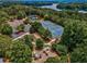 Areal view of the community tennis and play area, surrounded by lush trees at 330 Tupelo Trl, Canton, GA 30114
