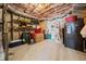 Unfinished basement area with shelving units, offering ample storage space and potential for various uses at 330 Tupelo Trl, Canton, GA 30114