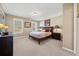 Cozy bedroom features neutral walls, carpeted floors, and ample natural light at 330 Tupelo Trl, Canton, GA 30114