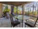 Covered patio featuring outdoor furniture and a view of the landscape at 330 Tupelo Trl, Canton, GA 30114