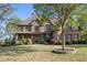 Stunning stone and brick home with a well-manicured front lawn at 330 Tupelo Trl, Canton, GA 30114
