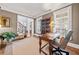 Home office with hardwood floors, plantation shutters, and custom built-ins at 330 Tupelo Trl, Canton, GA 30114