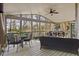 Spacious screened porch with seating, dining, and wooded views at 330 Tupelo Trl, Canton, GA 30114