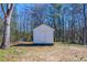 View of a white shed in the backyard at 8176 Camp St, Douglasville, GA 30134