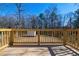 View of a white shed in the backyard from the deck at 8176 Camp St, Douglasville, GA 30134