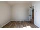 Bedroom boasts wood-look flooring and neutral paint at 8176 Camp St, Douglasville, GA 30134