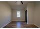 Bedroom featuring wood-look floors, ceiling fan and window at 8176 Camp St, Douglasville, GA 30134