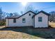 Side view of the house with new siding at 8176 Camp St, Douglasville, GA 30134