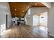 Open-concept living space with luxury vinyl floors, natural light, kitchen and breakfast nook at 8176 Camp St, Douglasville, GA 30134