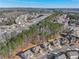 Desirable neighborhood aerial shot showcasing mature trees, well-maintained homes, and quiet, walkable streets at 1227 Clear Stream Rdg, Auburn, GA 30011