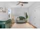 Inviting Bedroom featuring a stylish crib, dresser, and hardwood floors at 4834 Neal Rdg, Atlanta, GA 30349