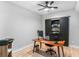 Bright office with modern desk, chair, and sliding barn door leading to closet at 4834 Neal Rdg, Atlanta, GA 30349