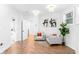 Sitting room featuring two chairs, a decorative plant and doorway views of bathroom at 4834 Neal Rdg, Atlanta, GA 30349