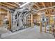 Unfinished basement area showcasing the home's ductwork, electrical panel, and essential systems at 7015 Polo Dr, Cumming, GA 30040